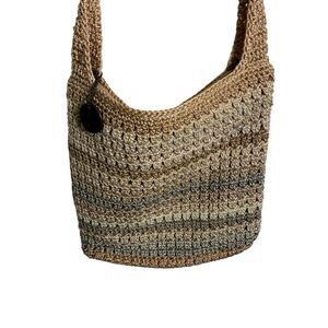 The Sak Crochet Crossbody Shoulder Bag, Tan And Beige Striped. Has Metal Accent